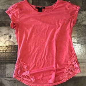 A pink shirt with lace